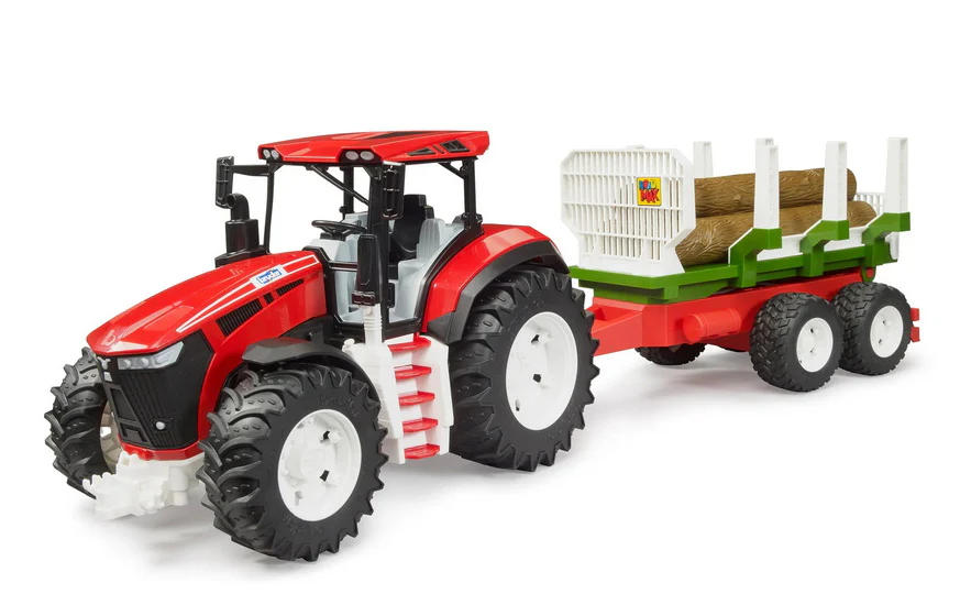 Tracteur Roadmax avec remorque à billots de bois